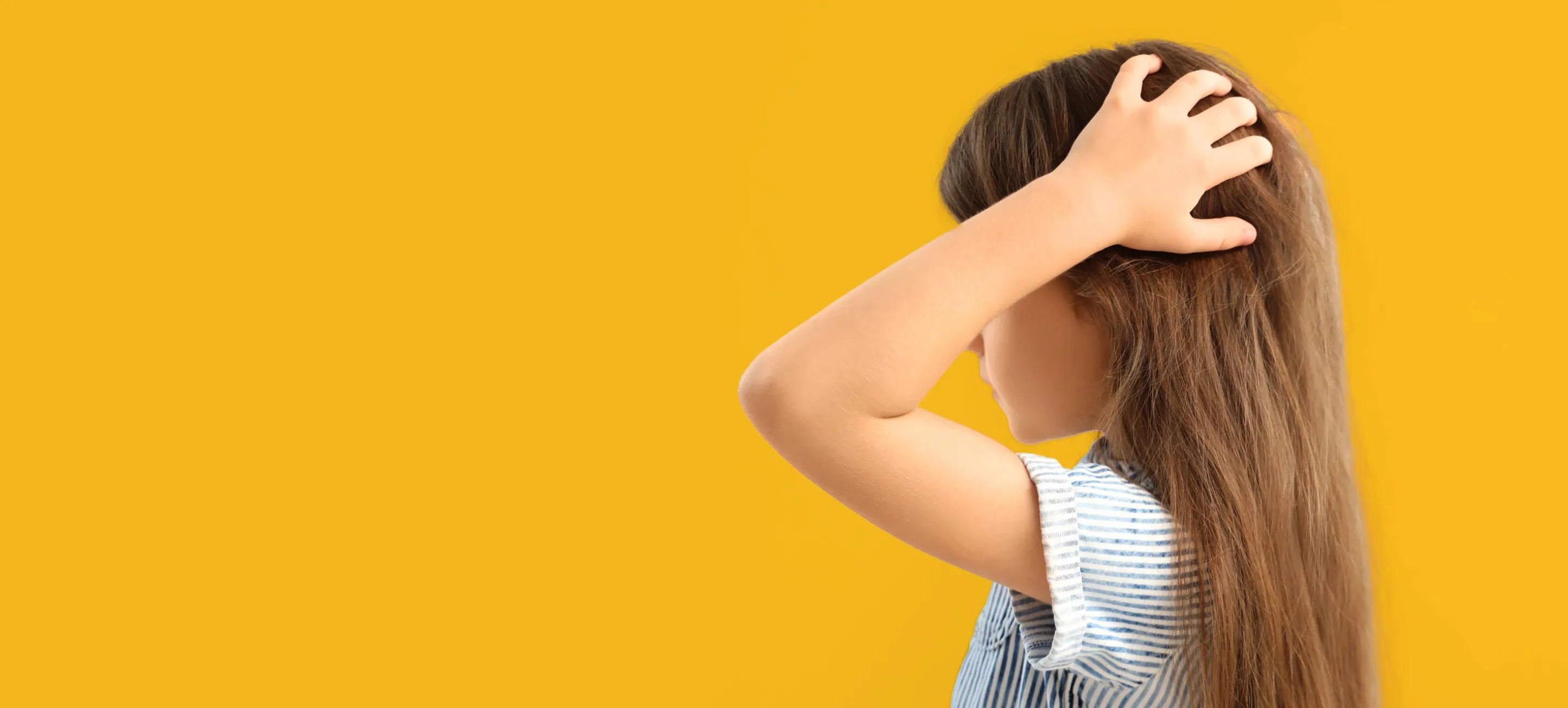 Young Girl with hands on hair