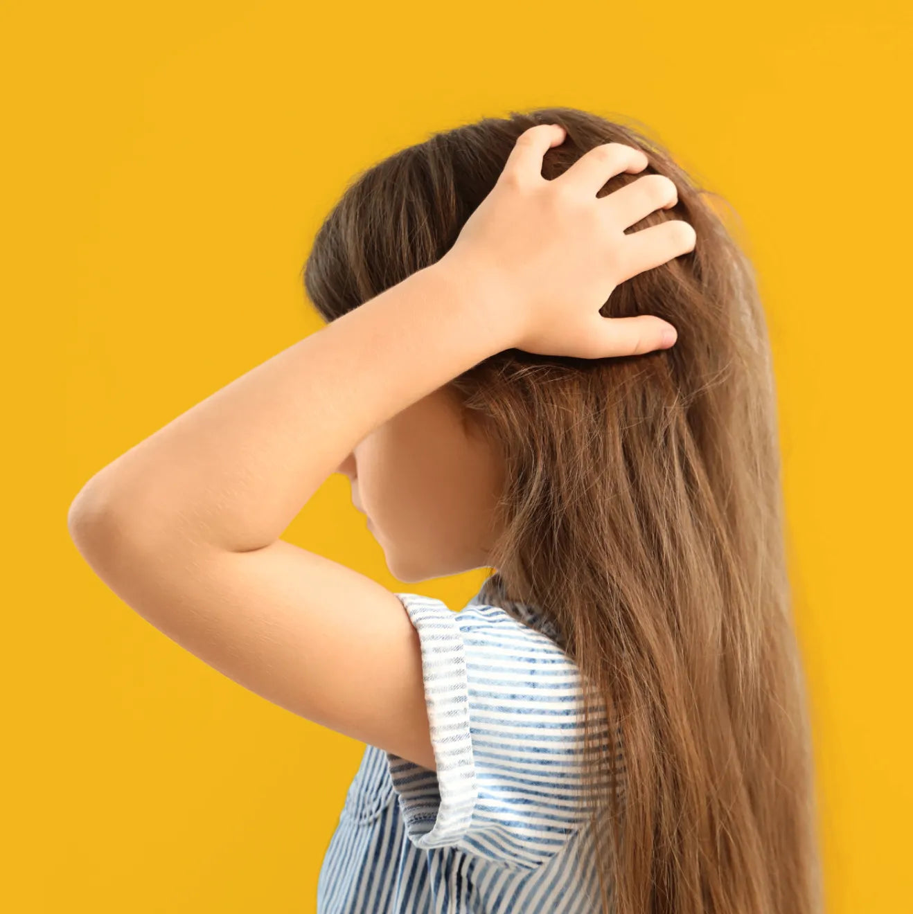 Young Girl with hands on hair